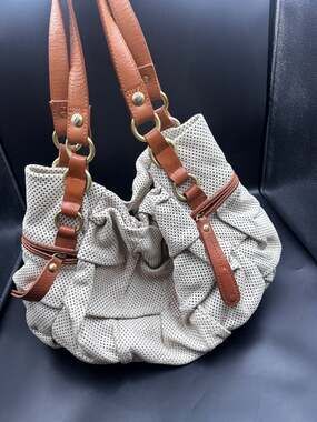Vince Camuto perforated leather hobo shoulder bag with pleated details